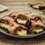 Involtini di melanzane e zucchine con speck e mozzarella, una ricetta gustosa per gli ospiti